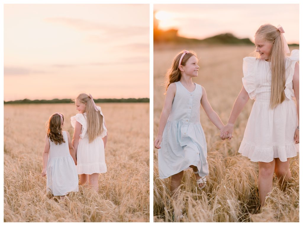 golden hour family shoot in Hampshire with Hampshire Photographer Lucylou Photography - young girls walking through Barley fields