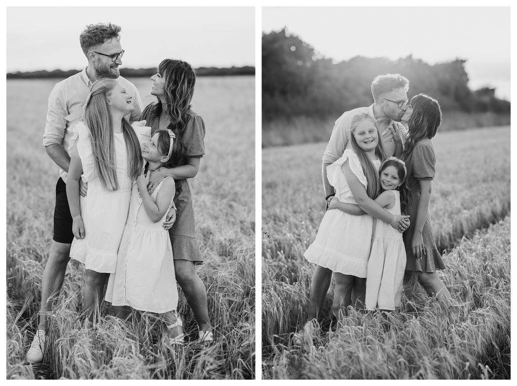 golden hour family shoot in Hampshire with Hampshire Photographer Lucylou Photography captures a natural golden hour moment of a blended family stood in a barley field. Photos are in black and white