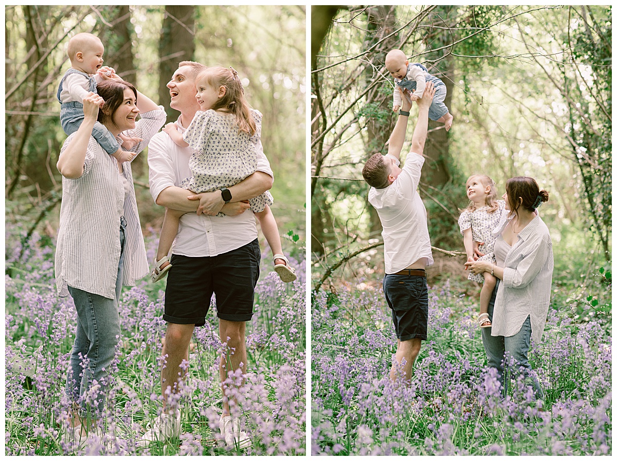 Professional Family Photos in the bluebells -parents holding young children showing love and connection