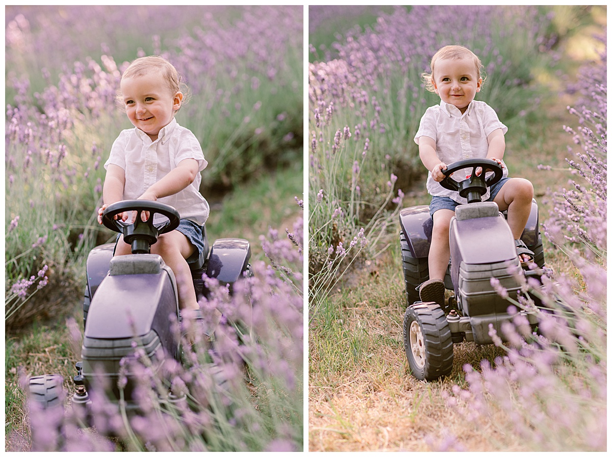 Little boy on tractor toy in the lavender